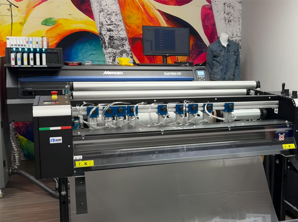 Neolt XY cutter in a factory environment, engineered for automated, high-speed trimming of printed media with exceptional accuracy and clean edge results.